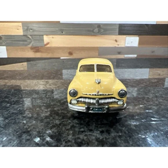 1:43 EMPIRE ZAUGG MODEL TIN WIZARD 6 MERCURY 51 1951 YELLOW
